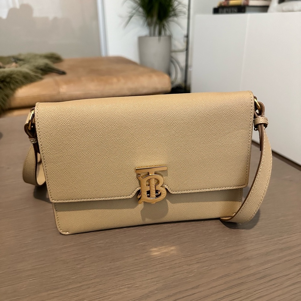 Small Burberry TB clutch in tan